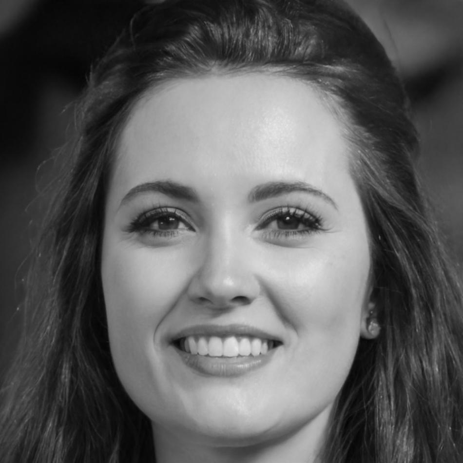 Professional headshot of financial education instructor